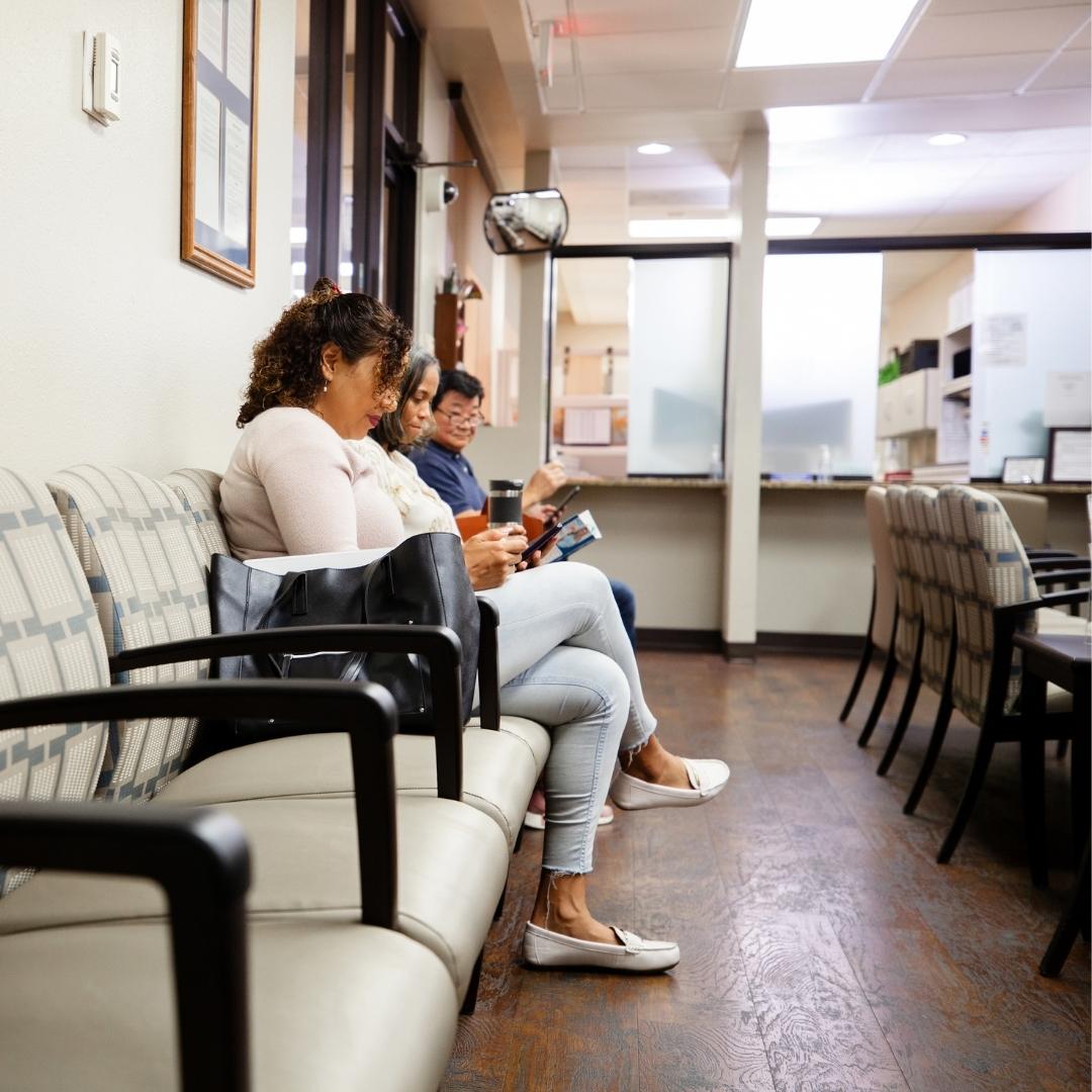 Patients in doctors office waiting room